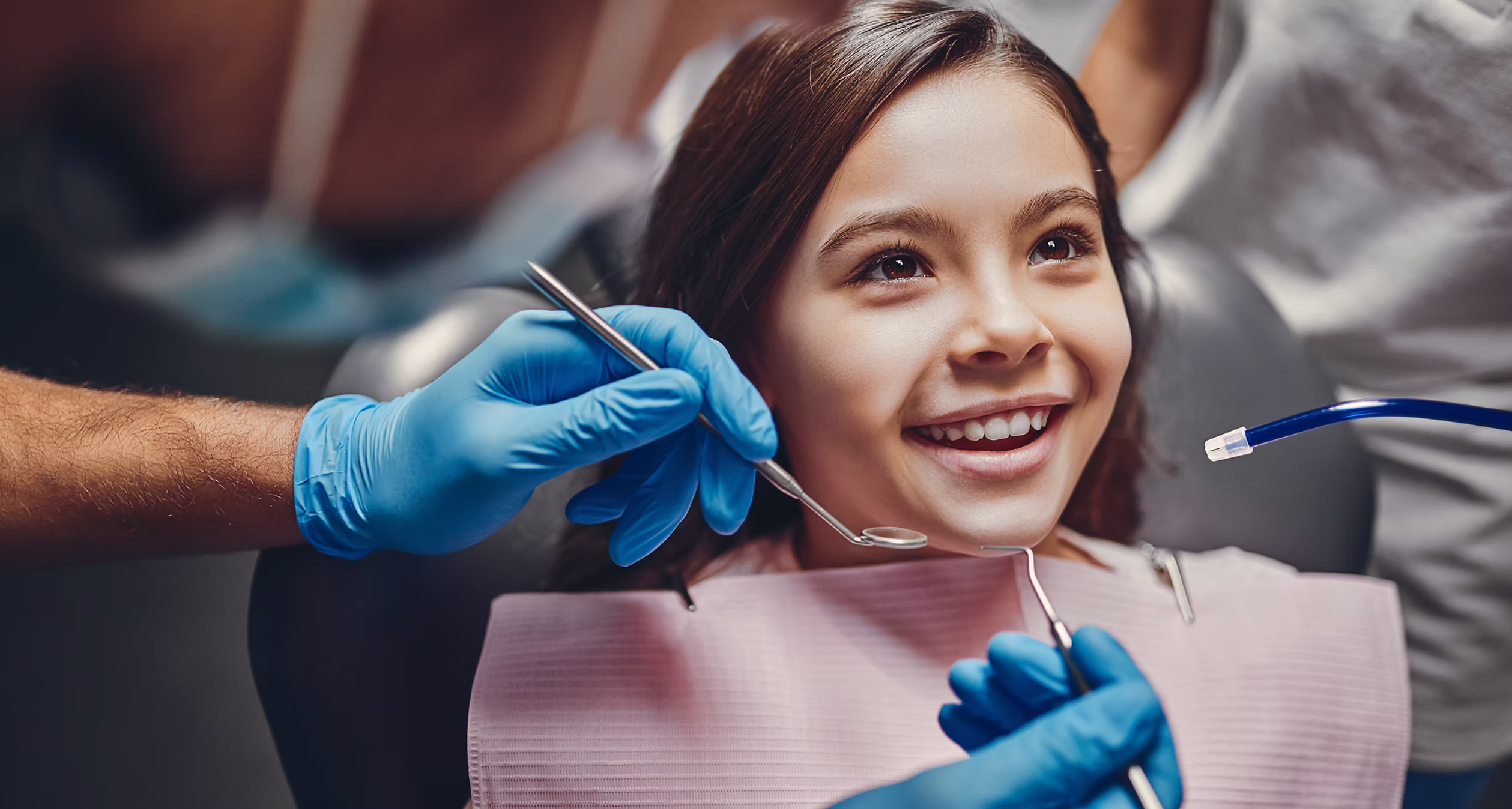 A child receiving gentle dental care
